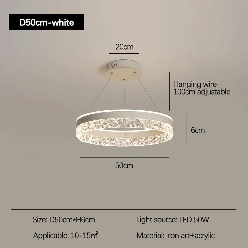 Modern luxe LED ring chandelier suspended in a contemporary living room with elegant minimalist décor.