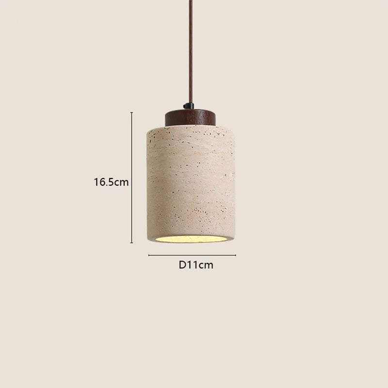 Wabi-Sabi Japanese pendant light with a natural stone-inspired shade hanging beside a modern bed.