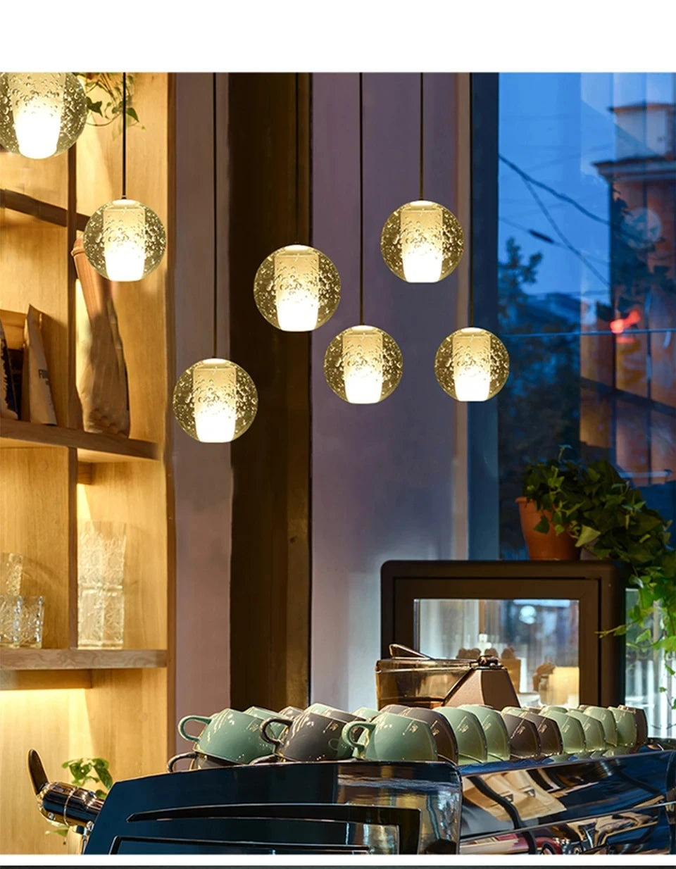 Modern spiral crystal LED chandelier cascading down a luxury staircase in a contemporary home.