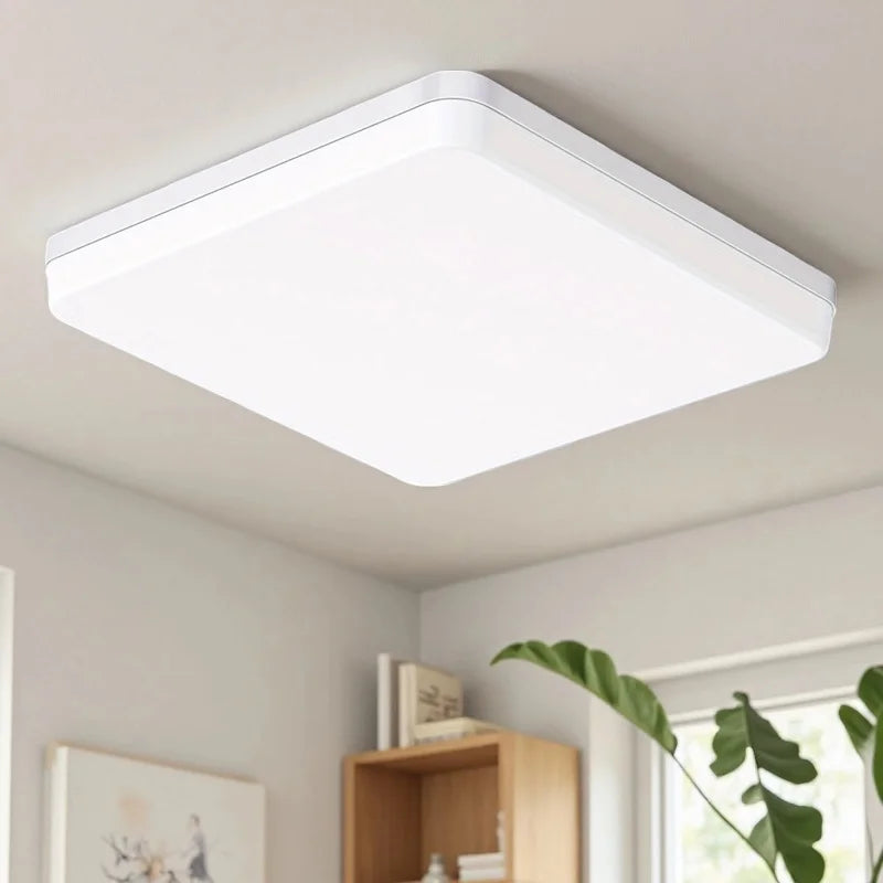 Modern LED flush mount ceiling light installed in a stylish living room with bright energy-efficient illumination.