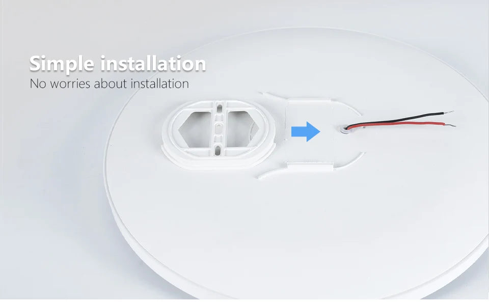 Smart dimmable LED ceiling light with remote control installed in a modern bedroom.