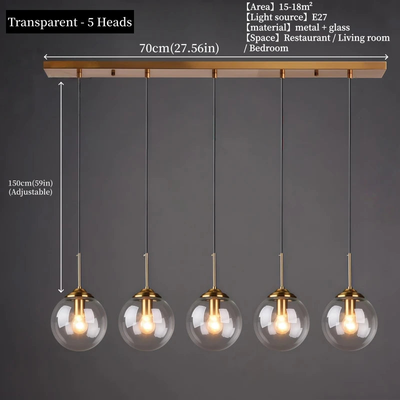 Modern luxury glass LED pendant light hanging above a dining table in a contemporary home.