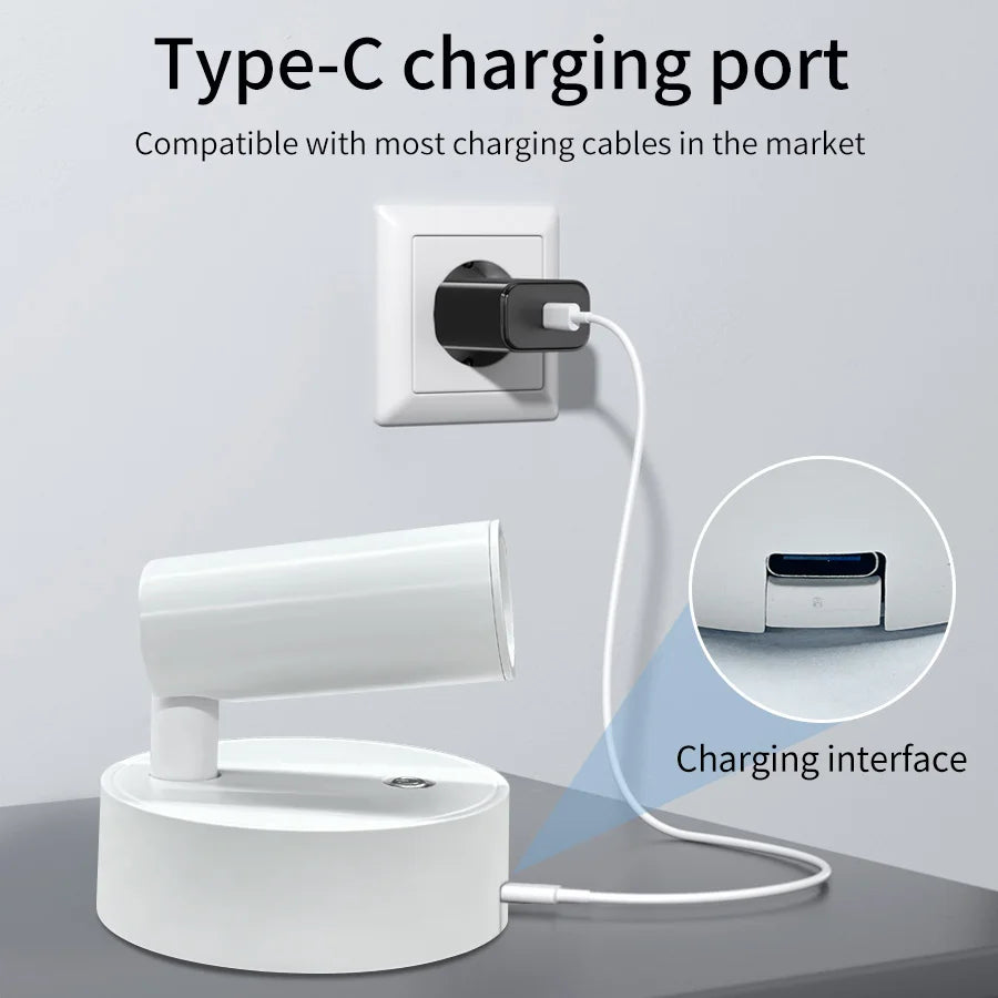 Magnetic rechargeable LED wall light mounted beside a bed with touch control and adjustable brightness.
