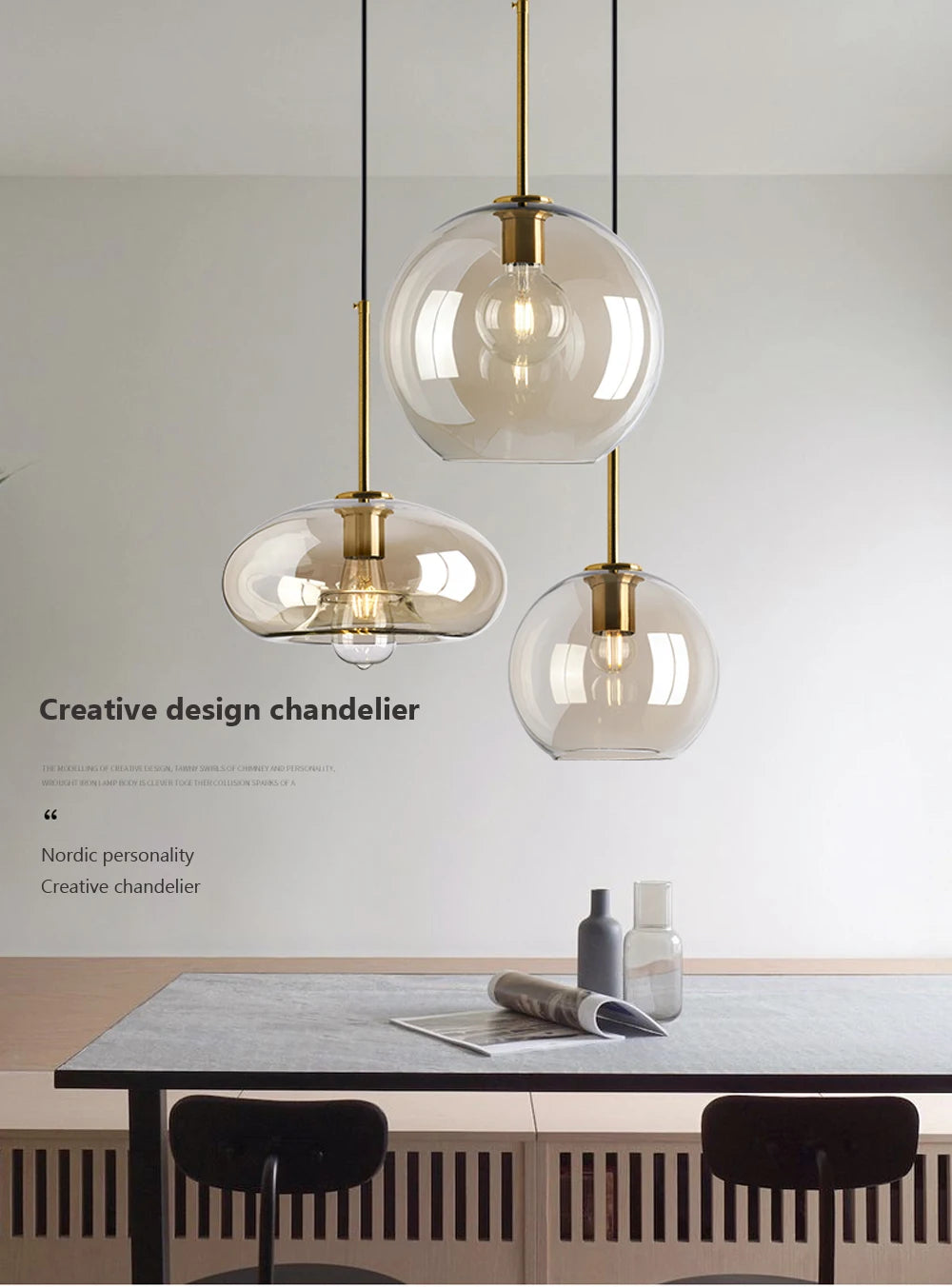 Nordic glass pendant light suspended above a kitchen island in a modern Scandinavian-inspired home.