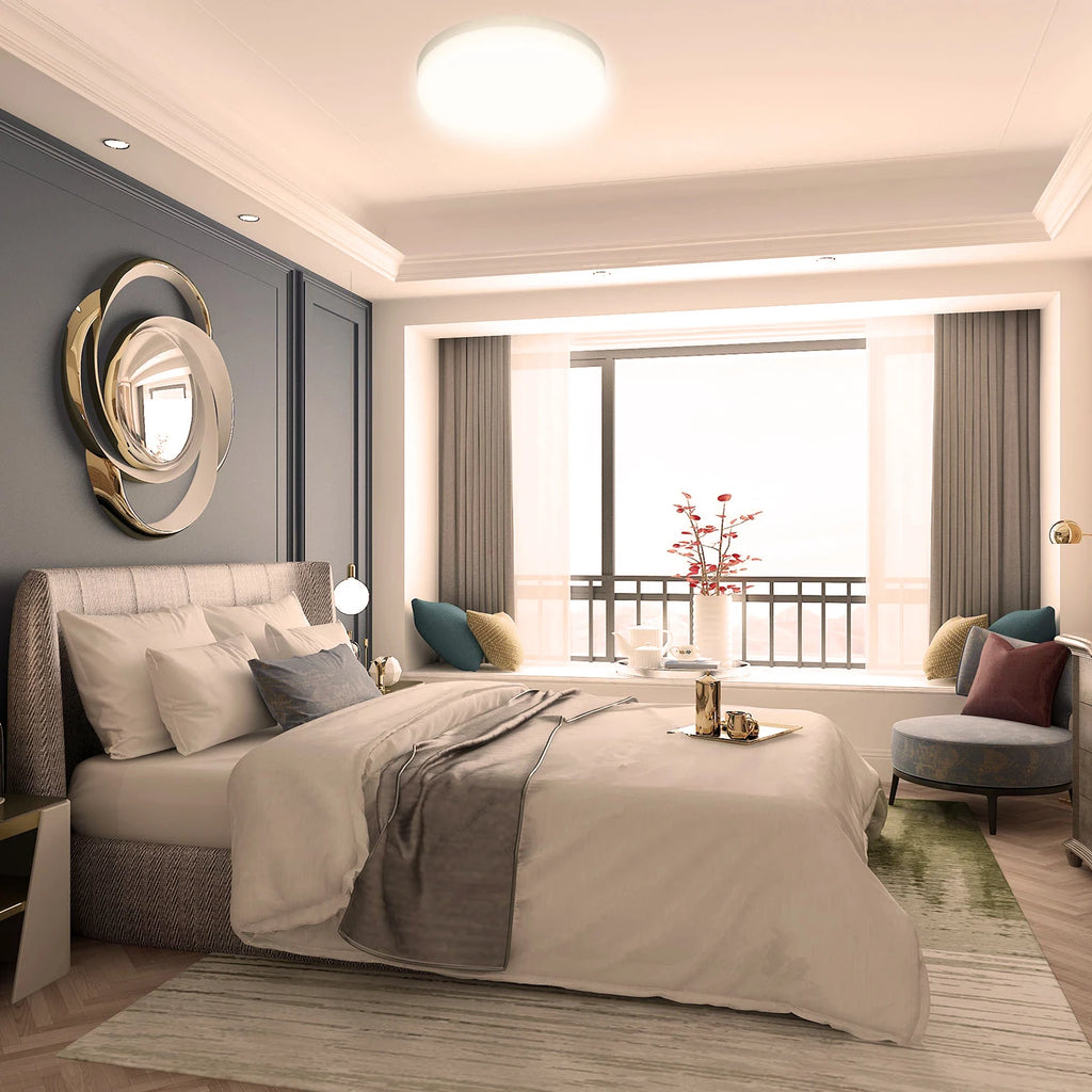 Modern Round LED Ceiling Light illuminating a stylish bedroom with elegant decor and natural light.