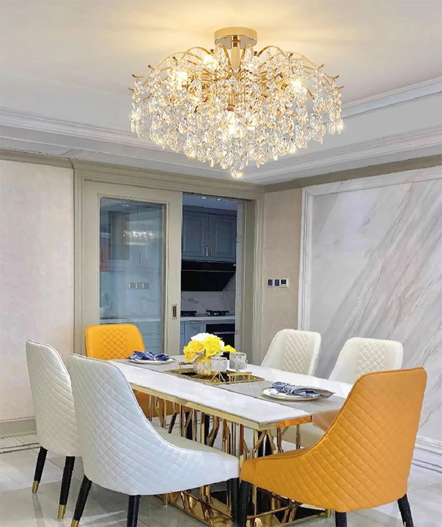 Modern luxury crystal LED chandelier installed in a stylish living room with elegant contemporary décor.