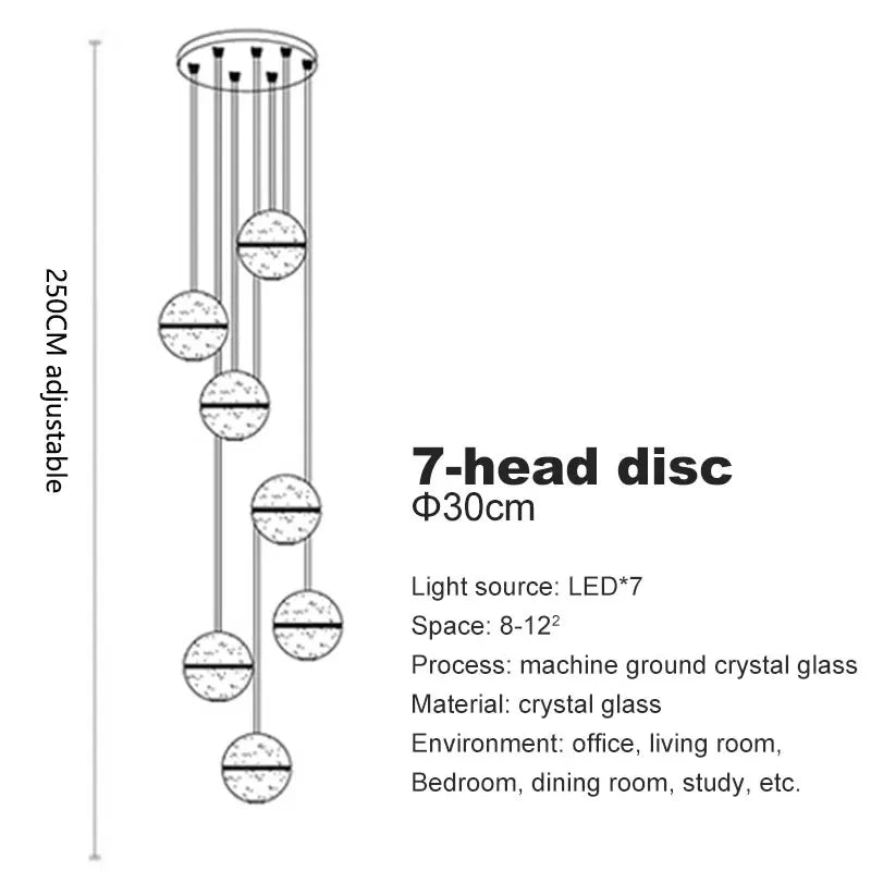 Modern spiral crystal LED chandelier cascading down a luxury staircase in a contemporary home.