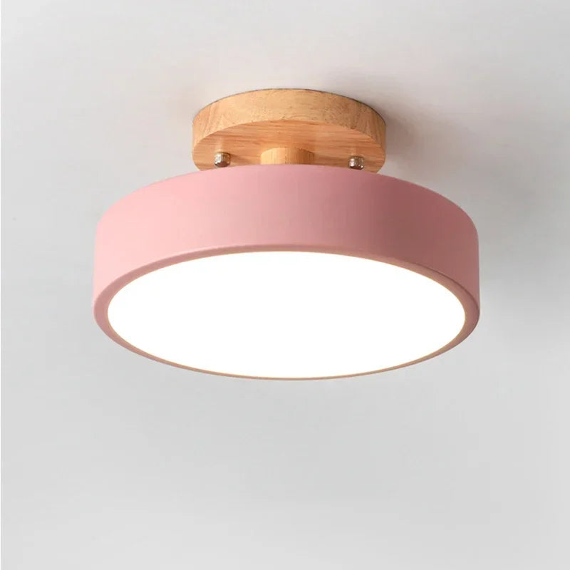 Nordic wood round LED ceiling light installed in a modern hallway with Scandinavian-inspired interior décor.