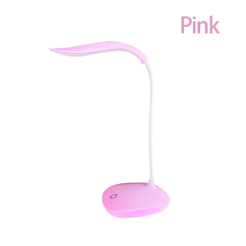 Modern LED eye care desk lamp with USB charging and touch dimming on a study desk.