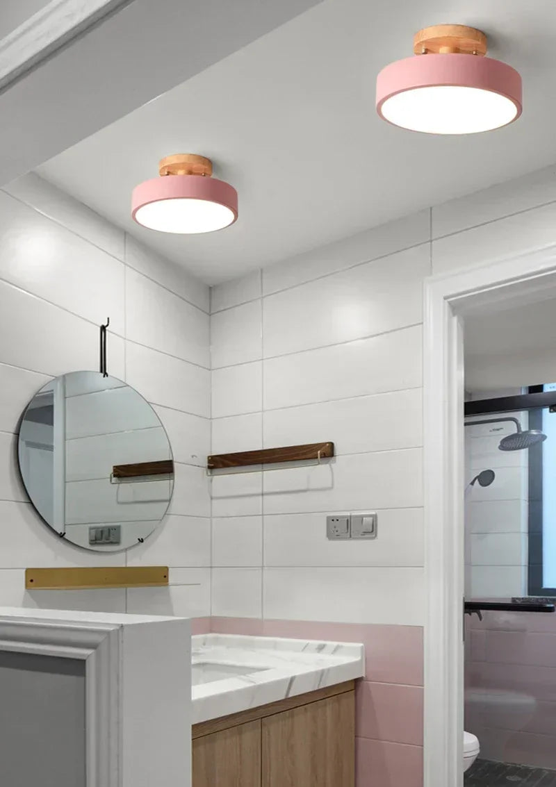 Nordic wood round LED ceiling light installed in a modern hallway with Scandinavian-inspired interior décor.