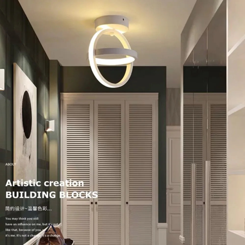 Modern 2 ring LED ceiling light installed in a stylish hallway with contemporary interior décor.