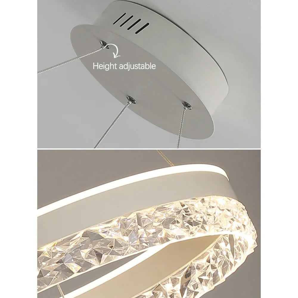 Modern luxe LED ring chandelier suspended in a contemporary living room with elegant minimalist décor.