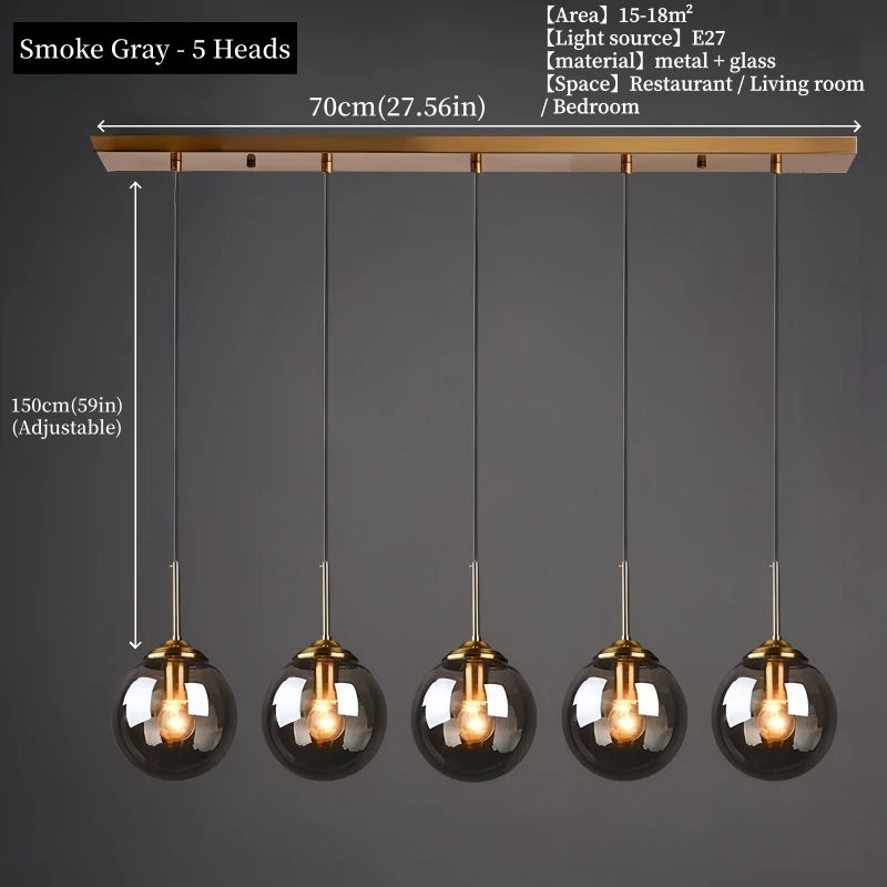 Modern luxury glass LED pendant light hanging above a dining table in a contemporary home.