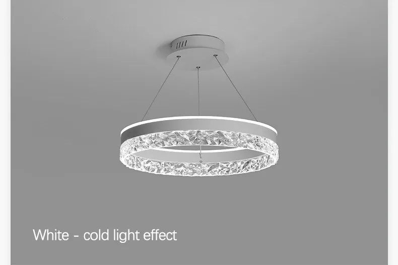 Modern luxe LED ring chandelier suspended in a contemporary living room with elegant minimalist décor.